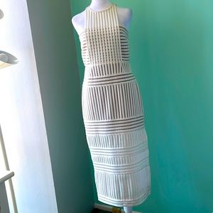 Beautiful cream color dress with tan color on the inside in size 10